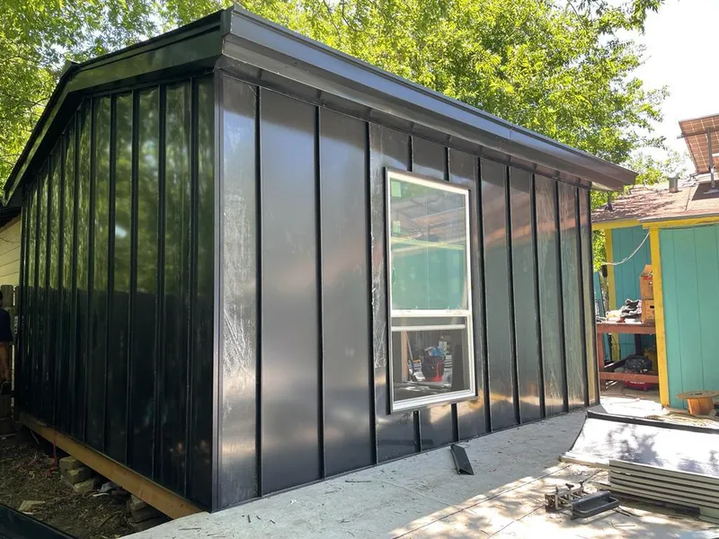 Black standing seam metal wall panels for Roof Inspection in Tyler