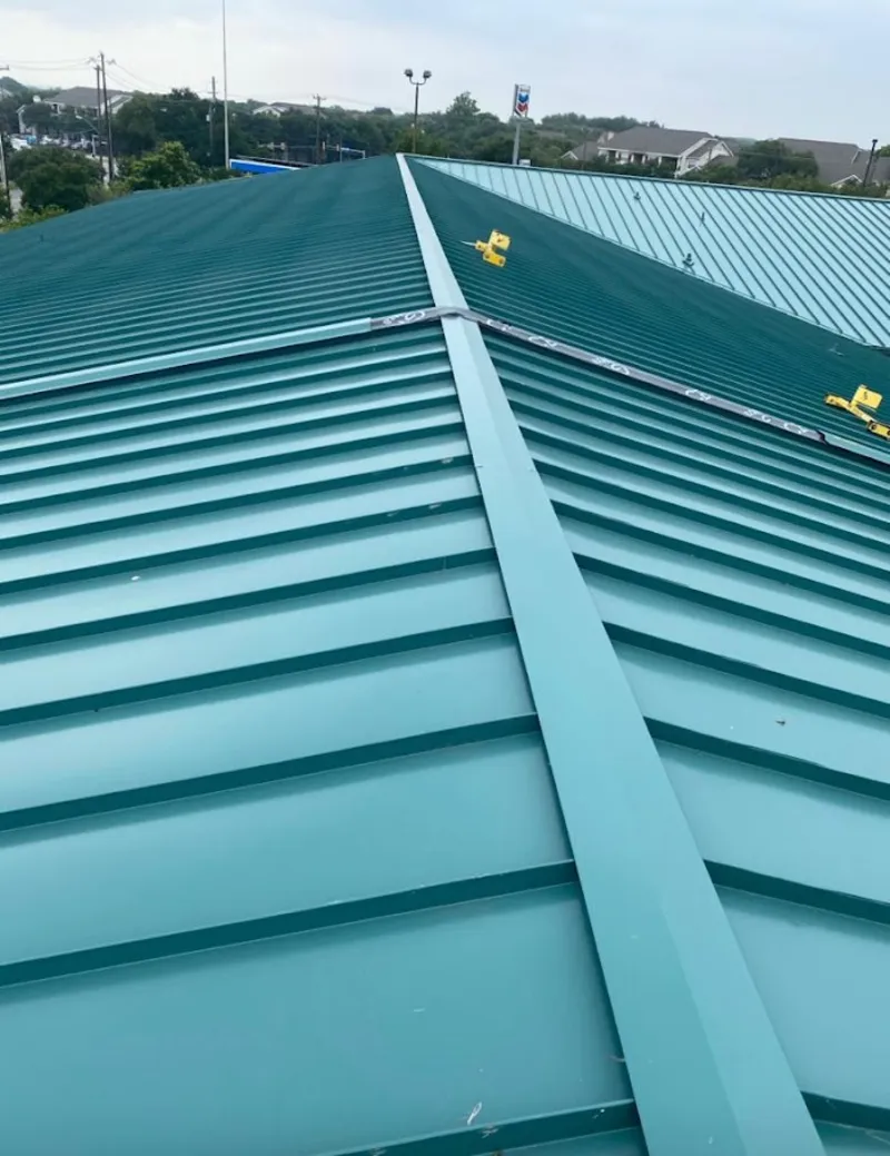 Green commercial metal roof ridge and valley for Metal Roof Repair in Tyler
