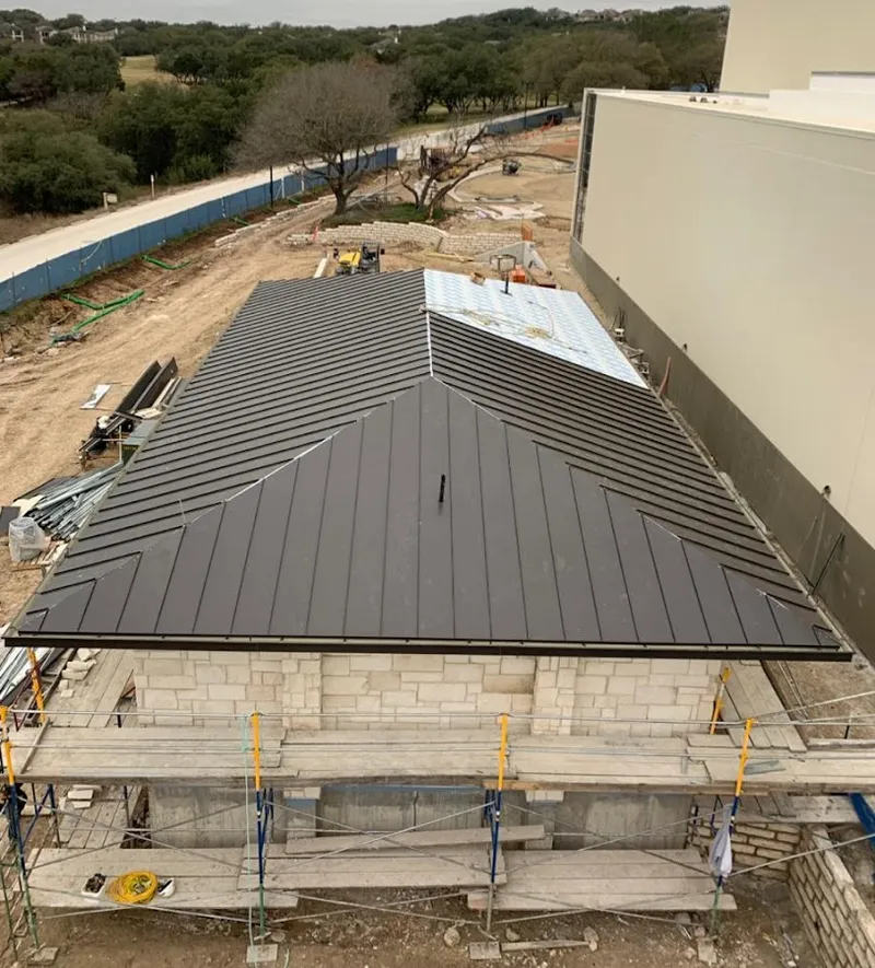Metal roof new construction with scaffolding in Tyler