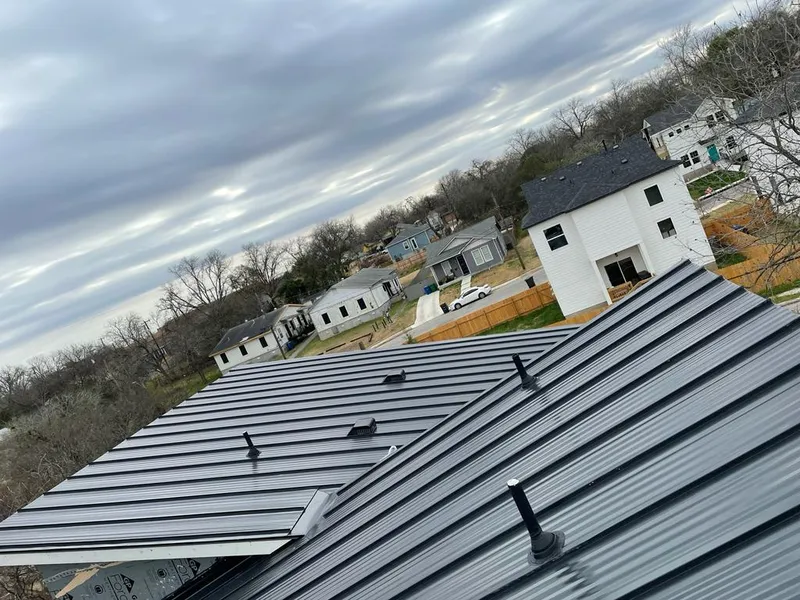 Standing seam metal roof panels with vents for Skylight Repair in Tyler